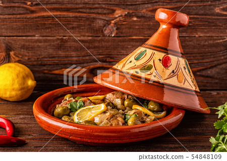 Traditional Moroccan chicken tagine with olives 54848109