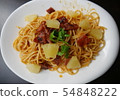 Spaghetti with pineapples and hams 54848222