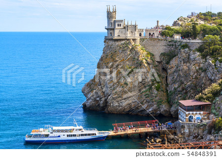 Swallow's Nest castle at the rocky coast of the Swallow's Nest castle at the rocky coast of the 54848391