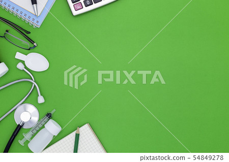 Stethoscope with notebook ,pen, white paper 54849278