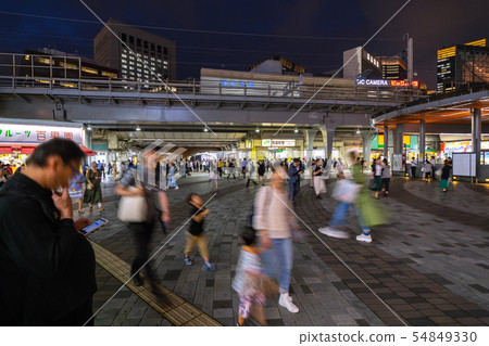 Tokyo cityscape in Japan Yurakucho station square (central exit) overlooking the street (no smoking area on the street) Tokyo cityscape in Japan Yurakucho station square (central exit) overlooking the street (no smoking area on the street) 54849330