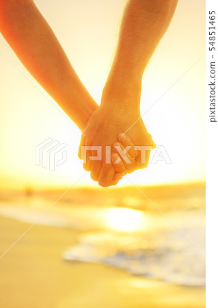 Couple in love holding hands - happy relationship 54851465