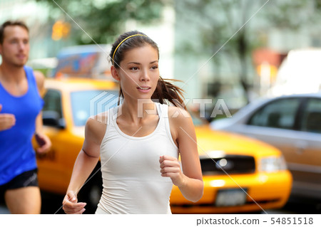 Active people jogging on New York city street, NYC Active people jogging on New York city street, NYC 54851518