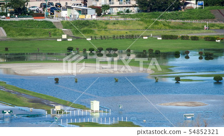 Tama River green area baseball field flooded by heavy rain 54852321