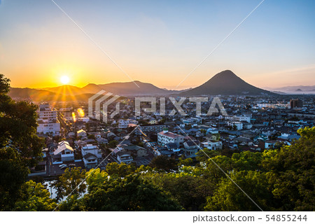 A view of Sanuki Fuji and the sunrise from Marugame Castle 54855244