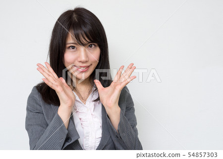 Woman spreading both palms 54857303
