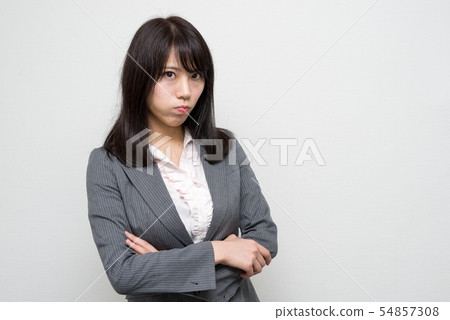 Woman bloating Woman bloating 54857308