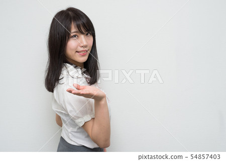 A woman who guides the body to the side A woman who guides the body to the side 54857403