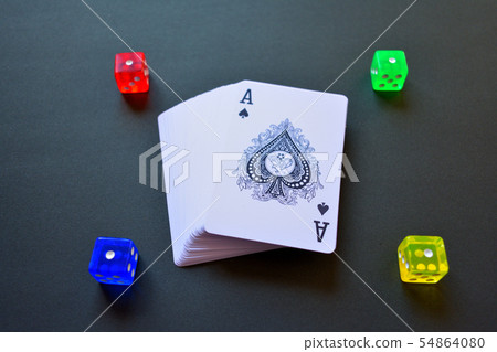 Playing cards and colorful dice Playing cards and colorful dice 54864080
