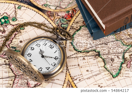 Vintage pocket watch clock on ancient map 54864217