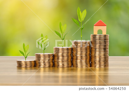 Mini model house on coins stack concept for Mini model house on coins stack concept for 54864250