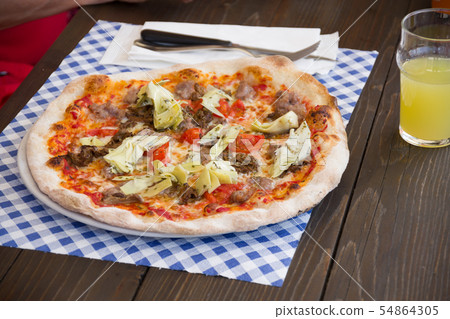 Italian pizza with sausages 54864305