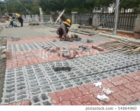 Concrete pavers preparation and installation work  54864960