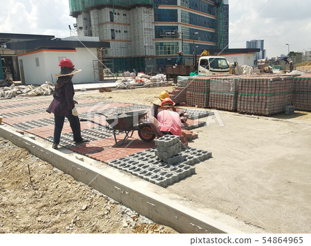 Concrete pavers preparation and installation work  54864965