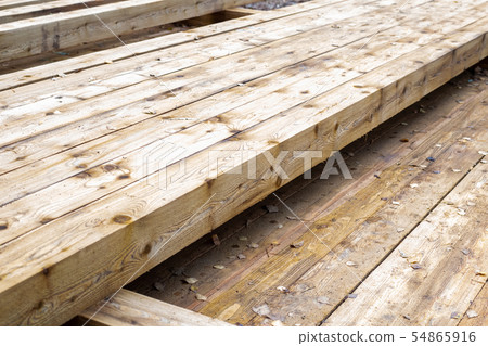 row long beige planks timber knot pattern sawmill 54865916