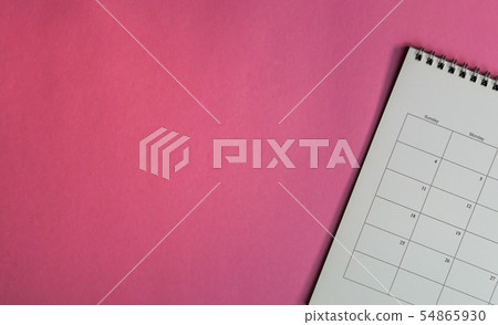 Top view of calendar or planner on an office desk Top view of calendar or planner on an office desk 54865930