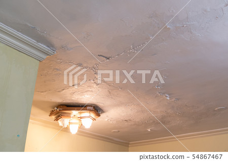 Water dripping from leaking ceiling Water dripping from leaking ceiling 54867467