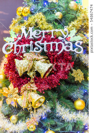 Christmas decoration on tree, closeup 54867474