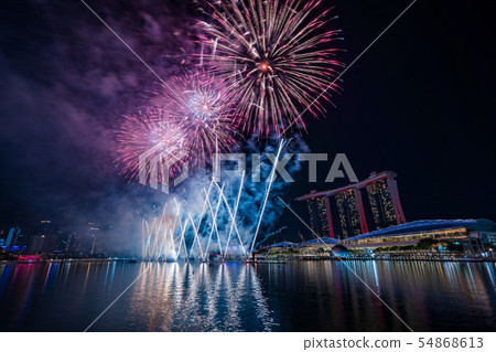Singapore night view and fireworks 54868613
