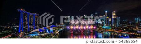 Singapore night view and fireworks wide panorama Singapore night view and fireworks wide panorama 54868654