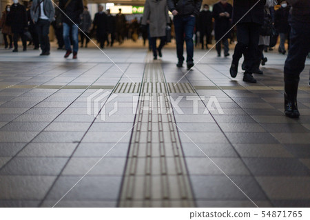 Sidewalk with braille blocks 54871765