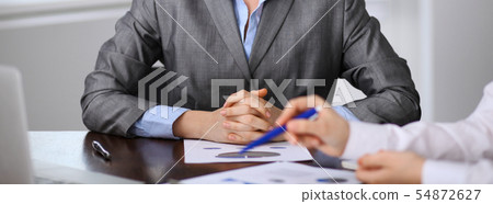 Business people discussion questions at the meeting. Negotiation concept 54872627