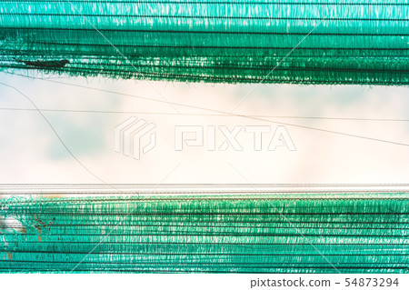 The Old green sun protection mesh and lack.  54873294
