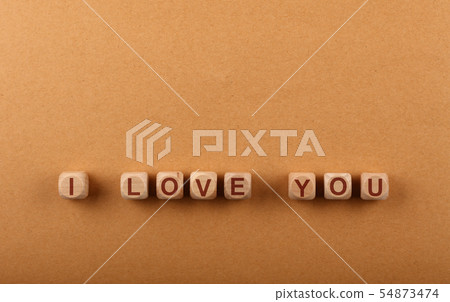 Wooden cubes with I LOVE YOU words over red 54873474