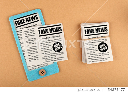 Felt craft smartphone with FAKE NEWS newspapers 54873477