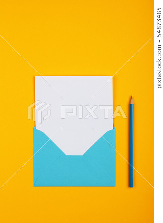 Open blue paper envelope over yellow 54873485