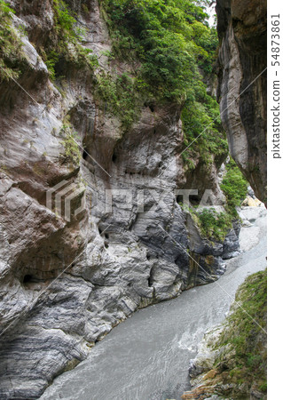 Dark river in taroko national park after rain 54873861