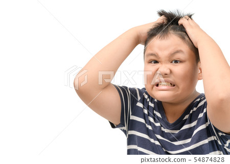 Obese boy itchy his head stress face headache 54874828