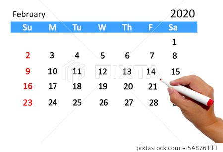 Hand highlighting date on calendar Hand highlighting date on calendar 54876111