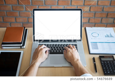 Image of Young man working in front of the laptop 54876689