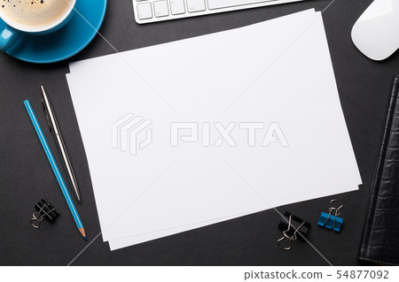 Office workplace table with blank paper page 54877092