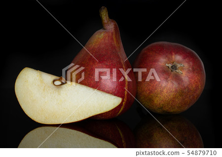 Anjou red pear isolated on black glass Anjou red pear isolated on black glass 54879710