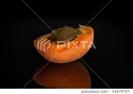 Fresh orange apricot isolated on black glass 54879787