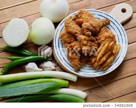 Fried chicken, French fries and vegetables 54882808