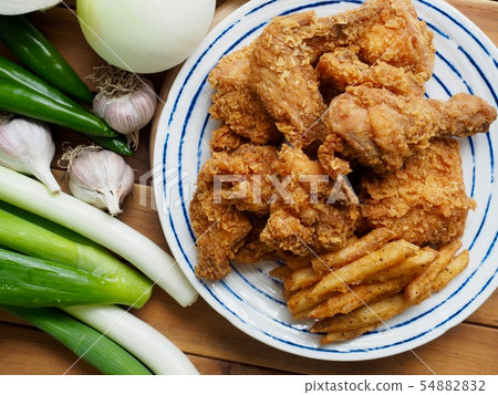 Korean chicken gangjung and fried potatoes 54882832