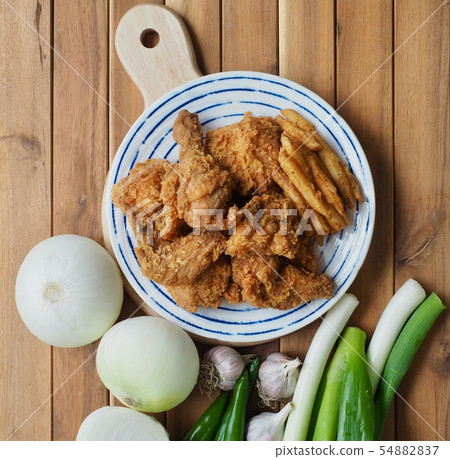 Korean chicken gangjung and fried potatoes 54882837