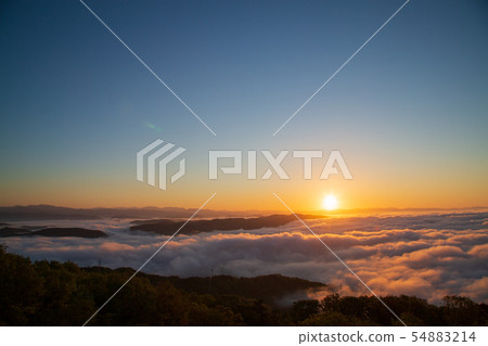 Clouds and sunrise at Takadani mountain 54883214