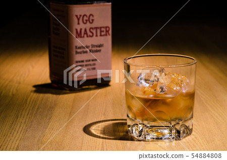Bourbon whiskey at the lock bar counter Bourbon whiskey at the lock bar counter 54884808