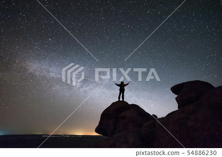 Mountaineer view of night sky with stars Mountaineer view of night sky with stars 54886230