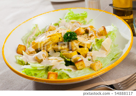 Caesar salad with grilled chicken Caesar salad with grilled chicken 54888117
