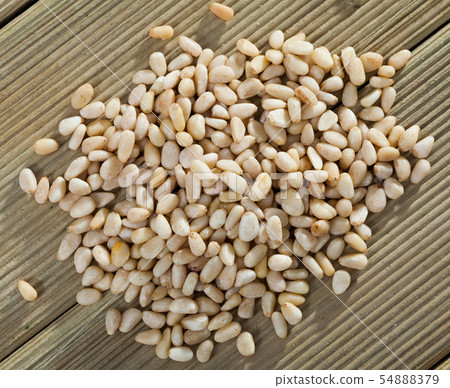 Picture of wooden desk with raw pine nut, nobody Picture of wooden desk with raw pine nut, nobody 54888379