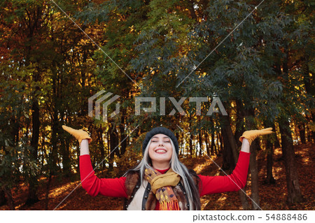autumn forest leisure happy lady fall nature park 54888486
