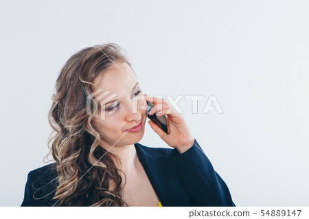 the concept of employment, interviews, advertising digital technology - businesswoman talking on the 54889147