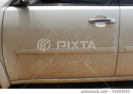 The car door has a heart shape and the word love The car door has a heart shape and the word love 54893093