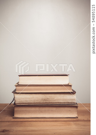 Books placed neatly on a table Books placed neatly on a table 54895115