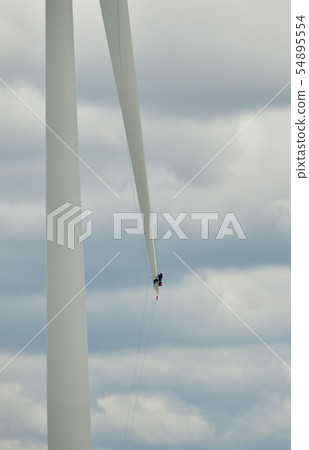 Taking pictures of landscape maintenance of wind turbines for wind power generation in Asukazawa, Hokkaido 54895554